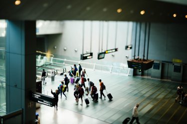 airport passengers with luggages