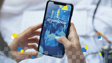 APS image of a phone displaying the airport show app