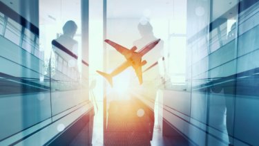 APS blog image of travelers with suitcases in an airport with an airplane and sunlight overlay
